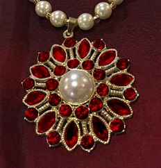 Photoshopped pendant with garnets instead of diamonds